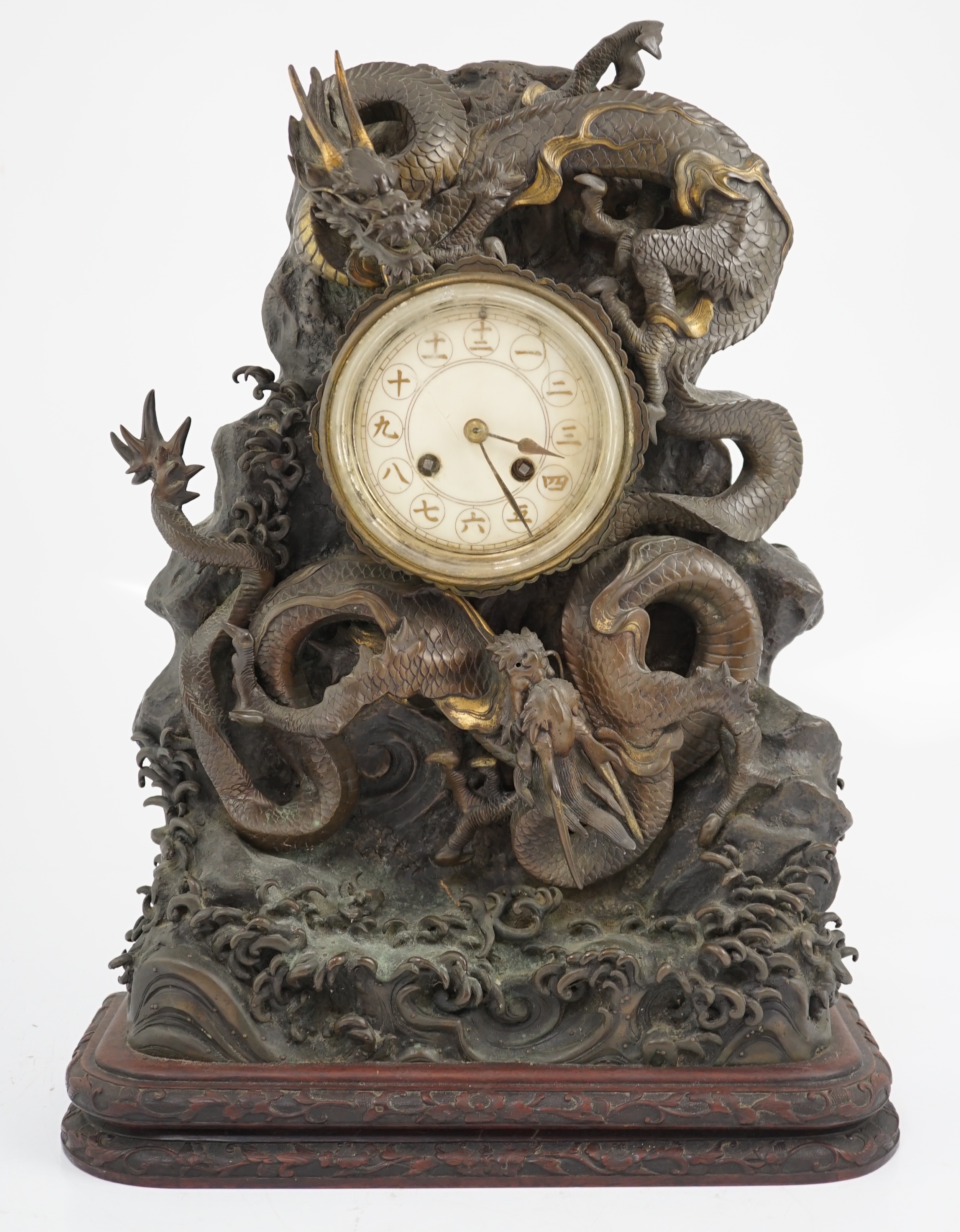 A Japanese parcel gilt bronze ‘dragon’ mantel clock, Meiji period, CITES submission reference:WX9VSMU6